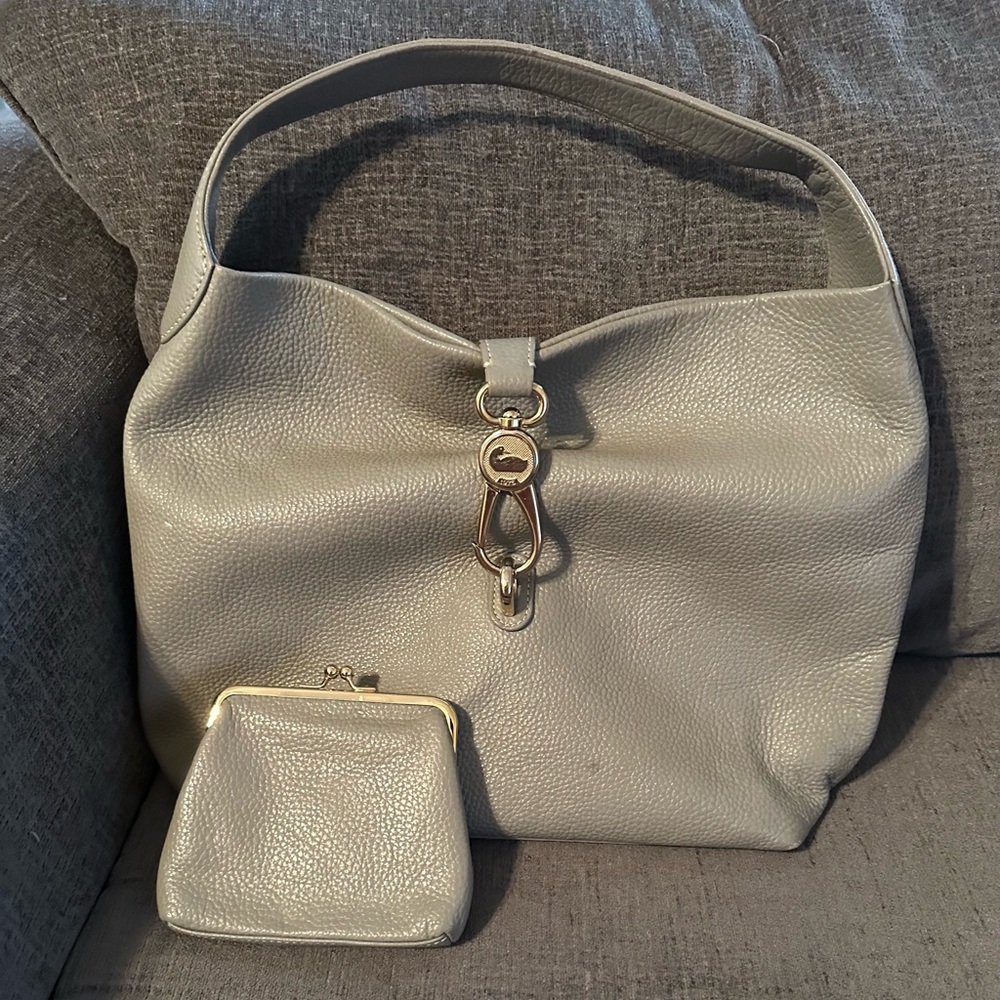 Dooney & Burke light gray large shoulder bag with coin purse.